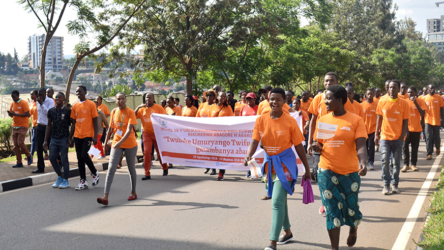Members of the public during a walk on the occasion of the launch of the annual â€˜16 Days of Activism against Gender-Based Violenceâ€™ campaign in Kigali yesterday. The walk started from the Parliamentary Buildings in Kimihurura and ended at Amahoro National Stadium in Remera, where discussions were subsequently held.  This yearâ€™s campaign is running the national theme, â€˜Building the Family We Want. Say No To Child Defilementâ€™. Frederick Byumvuhore.