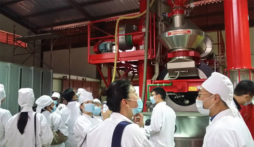 The staff of the Chinese embassy visit the coffee roasting plant. Photos by Michel Nkurunziza.