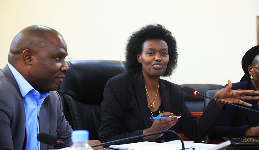 The Chairperson of the Parliamentary Standing Committee on Agriculture, Livestock and Environment, Ignatienne Nyirarukundo, speaks as Jean Claude Musabyimana, the Permanent Secretary  at the Ministry of Agriculture, looks on yesterday. Sam Ngendahimana