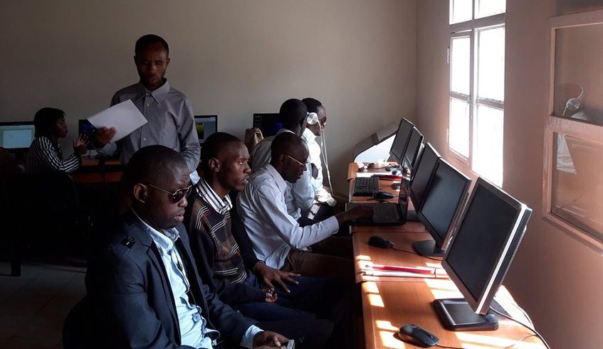 Visually impaired people operate computers at the launch of an ICT centre for persons with disabilities on Day 1 of Disability Week in Kicukiro District yesterday. Courtesy.