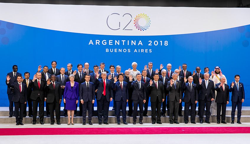 G20 and other invited world leaders, including President Paul Kagame (3rd right, back row), in a group photo on Day I of the 13th G20 Leadersu2019 Summit in Buenos Aires, Argentina yesterday. Village Urugwiro.
