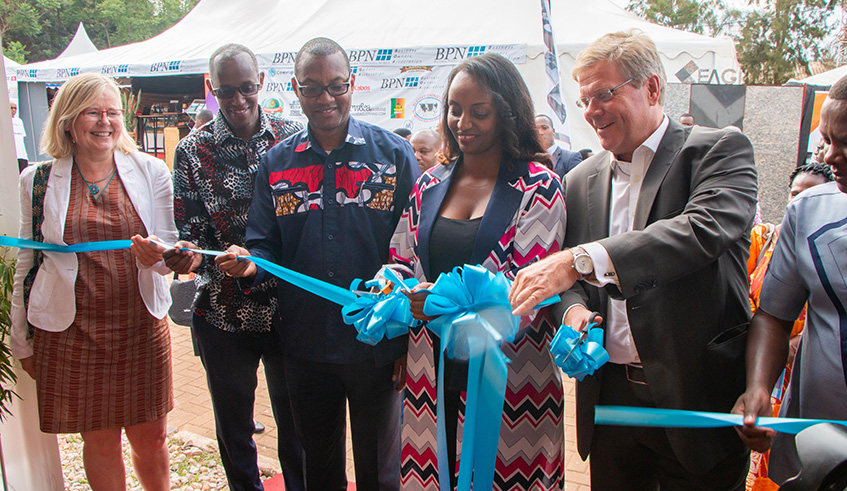 The Minister for Trade and Industry Soraya Hakuziyaremye (2nd right) and other officials open Made-in-Rwanda Expo 2018 at Gikondo Expo Grounds yesterday. The exhibition is scheduled to run through December 4. Emmanuel Kwizera.
