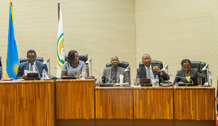 National Bank of Rwanda Governor John Rwangombwa (2nd right) presents BNRu2019s annual activity report at Parliament on Thursday. Emmanuel Kwizera