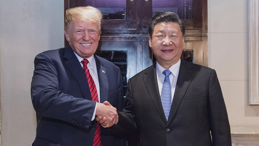Chinese President Xi Jinping (right) and his U.S. counterpart, Donald Trump, agreed Saturday to take measures to ease bilateral trade tensions and keep up close contacts. Net photo.