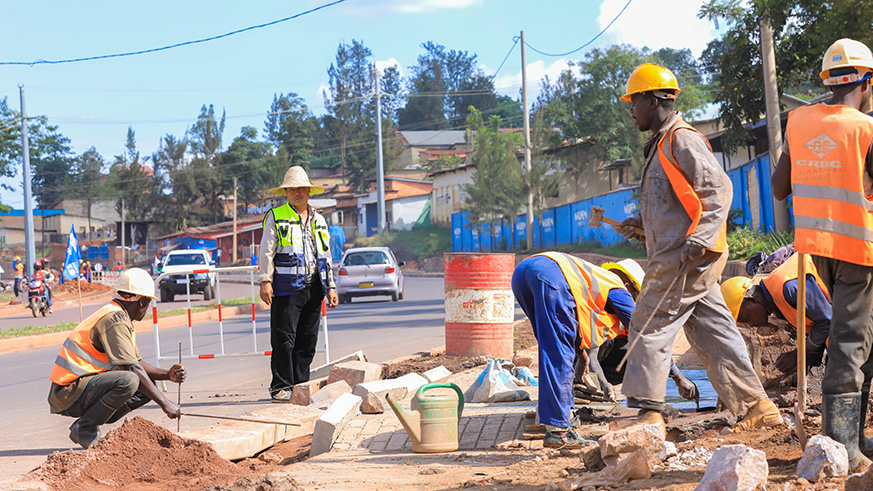 Workers on the Sonatubes-Kumazi road project. Rwanda Public Procurement Authority has blacklisted 197 companies, over breach of contract. / Photo by Emmanuel Kwizera.