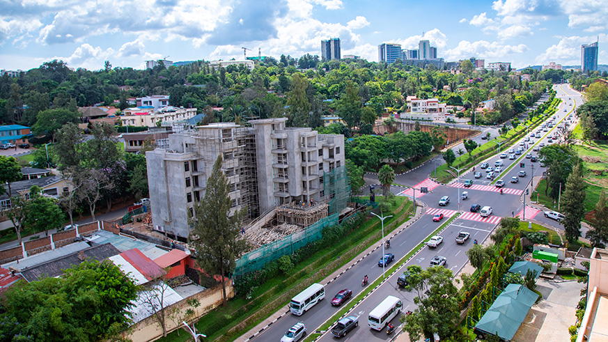 An aerial view of part of City of Kigaliu2019s Central Business District with the freshly painted white-and-red pedestrian crossing at Peage road junction, Kiyovu, as captured on Thursday. The police are in the process of repainting pedestrian crossings across the country from white and black to white and red to increase visibility of the markings as part of a broader effort to reduce road accidents. Photo/Emmanuel Kwizera.