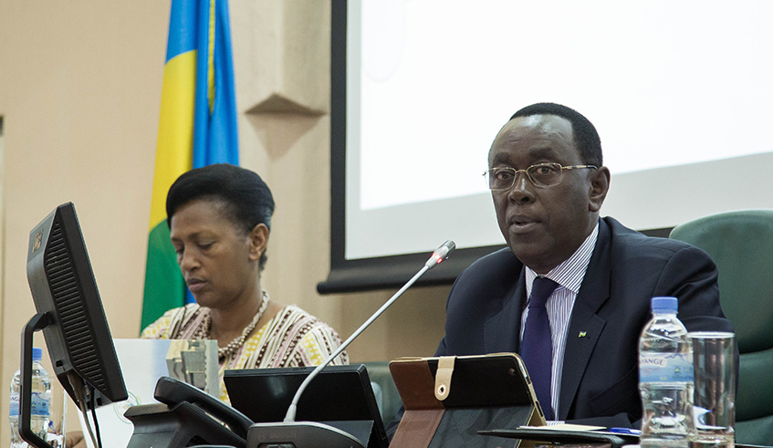Senate president Bernard Makuza speaks during a session as Senate vice-president in charge of Administration and Finance Jeanne du2019Arc Gakuba looks on yesterday. A monetary value should be put on the contribution of electoral volunteers to ascertain the real cost of elections in Rwanda, a senatorial standing committee said in a report presented to the Upper House Monday. Nadege Imbabazi.