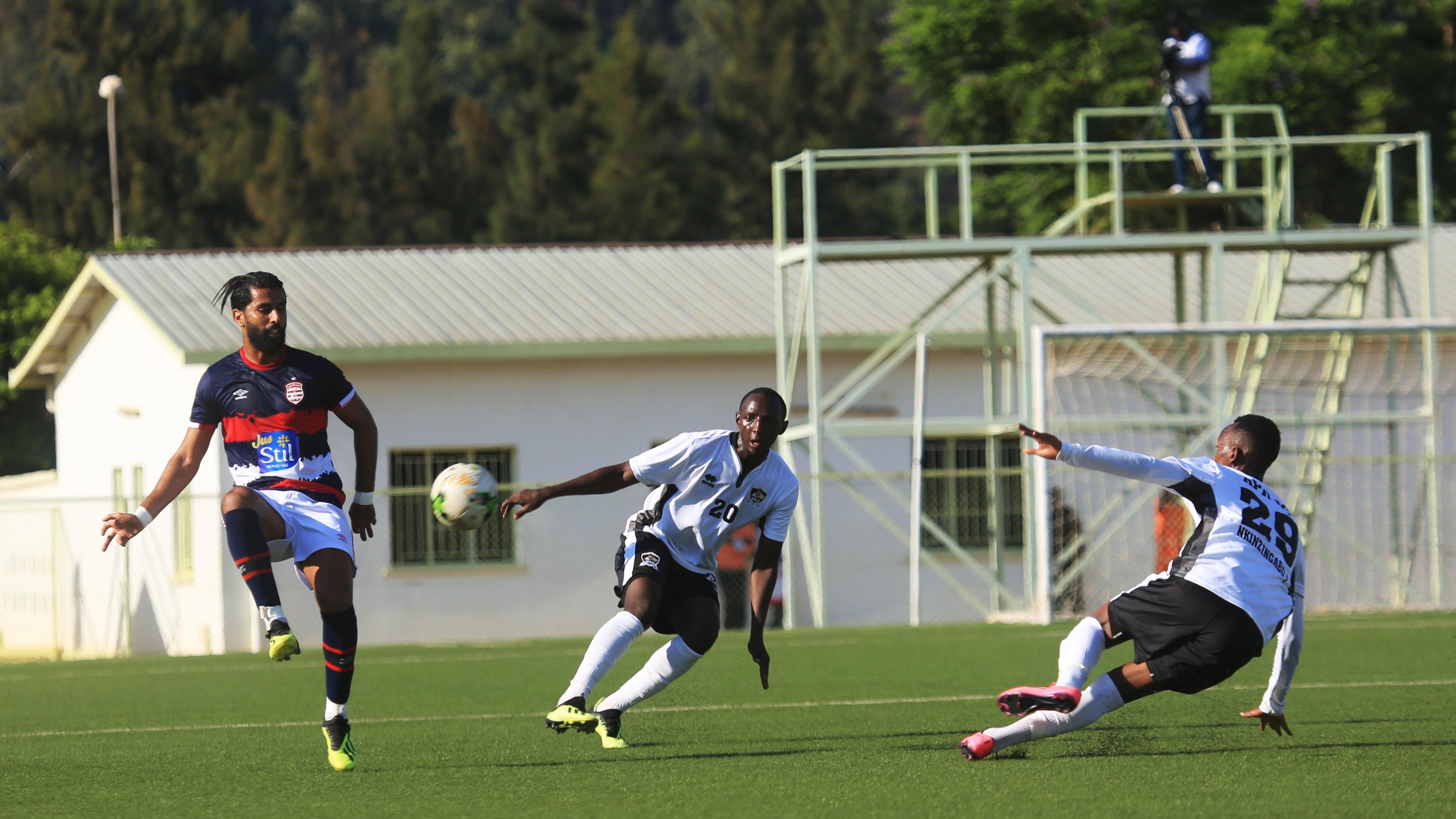Club Africain defender Fakhreddine Jaziri controls the ball against APR's Andrew Buteera (C) and Fiston Nkizingabo (R) during the 0-0 draw in the first-leg clash at Kigali Stadium on November 28. / Sam Ngendahimana