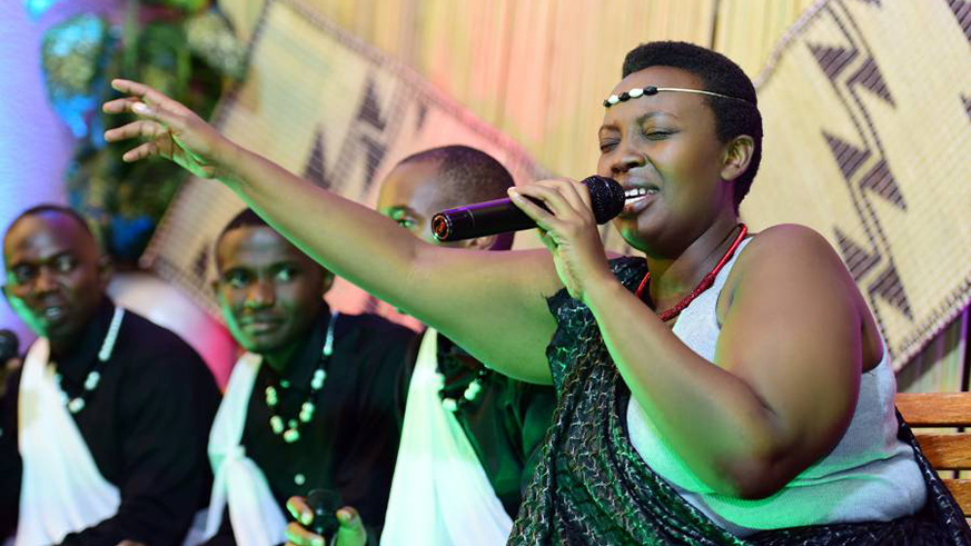 Alouette Munganyinka, one of Inkera troupe singers, doing what she does best during a past event.