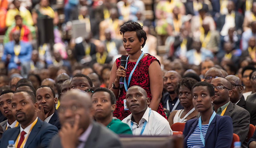 A participant asks a question during Umushyikirano at Kigali Convention Centre last year. Village Urugwiro.
