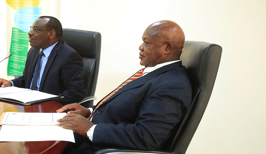 The Minister for Infrastructure, Amb. Claver Gatete (left), and his Tanzanian counterpart, Isack Kamwelwe, during the signing ceremony in Kigali on Tuesday. Sam Ngendahimana.