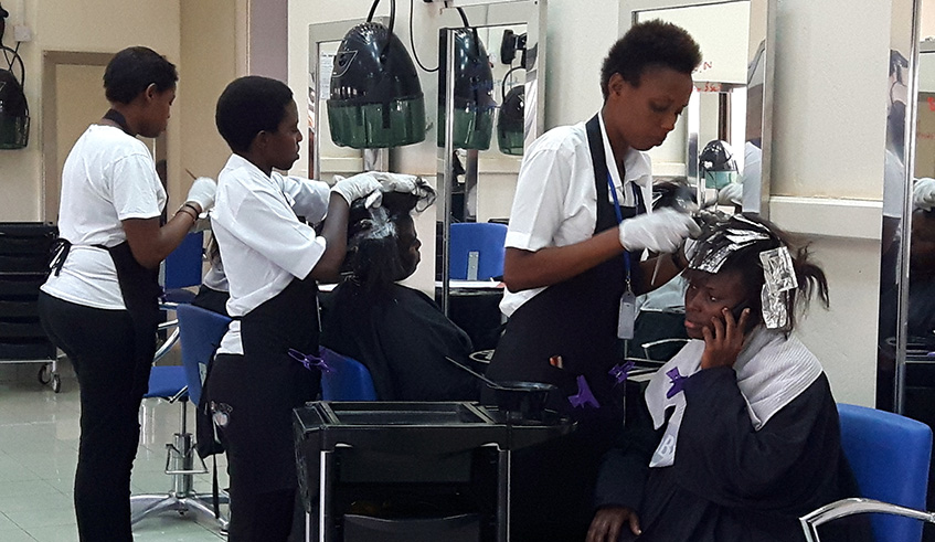 trained girls in hairdressing commit to create jobs.Michel Nkurunziza