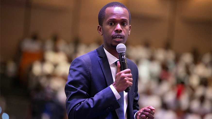 CMAu2019s Ag Executive Director, Eric Bundugu speaks to the youths about the importance of saving through capital markets. Courtesy.