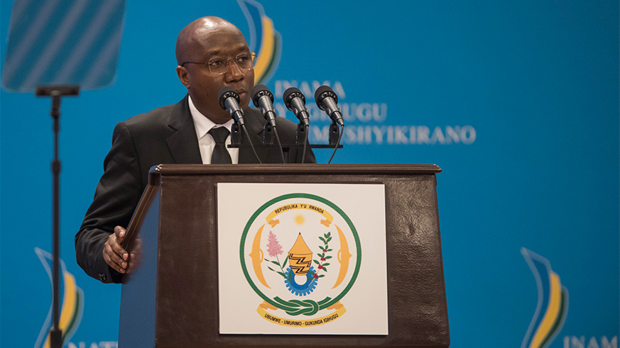 Prime Minister Edouard Ngirente presents the status of implementation of the 2017 Umushyikirano resolutions at Kigali Convention Centre yesterday. Village Urugwiro.