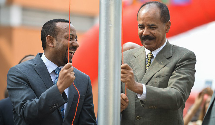 Ethiopiau2019s Prime Minister Abiy Ahmed (left) and Eritreau2019s President Isaias Afeworki celebrate the reopening of the Embassy of Eritrea in Addis Ababa in July. Net photo.