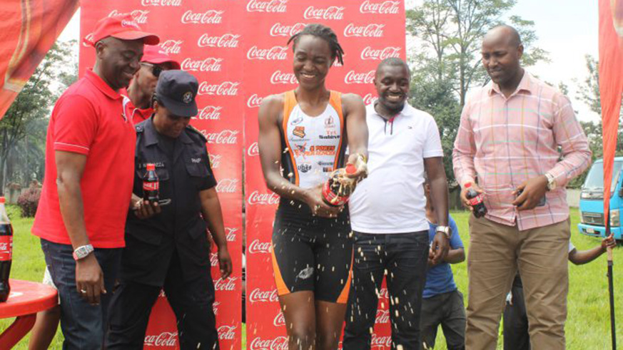 Hanani Uwineza celebrates after winning Rubavu Triathlon Challenge in March this year. File photo.