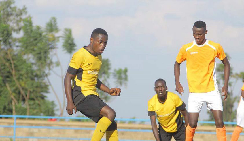 Hussein Ciza (left) in action during Mukurau2019s 3-0 win over second division side Heroes FC in a preseason friendly game at Huye Stadium. File photo.