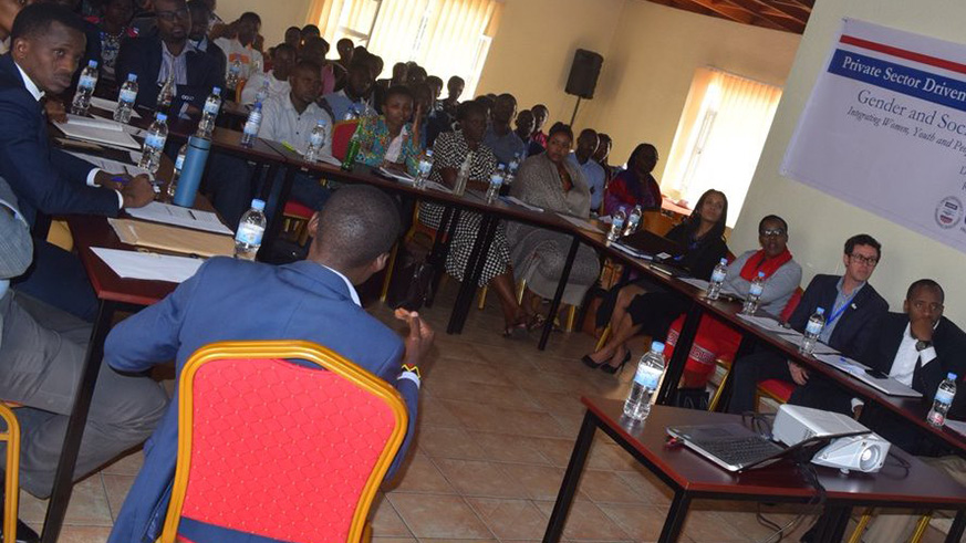 Stakeholders discuss how to boost job creation for the youth and women. Michel Nkurunziza.
