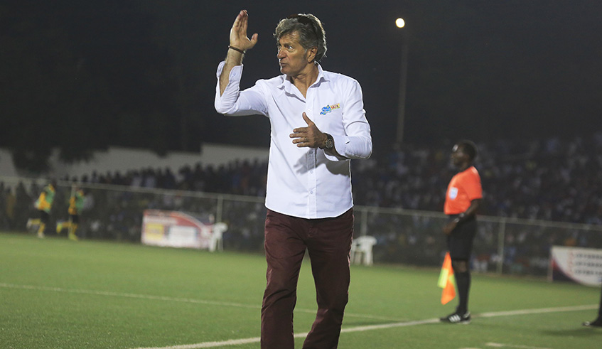 Rayon Sports head coach Roberto Oliveira u2018Robertinhou2019 Goncalves de Calmo communicates to his players during a past match. Sam Ngendahimana.