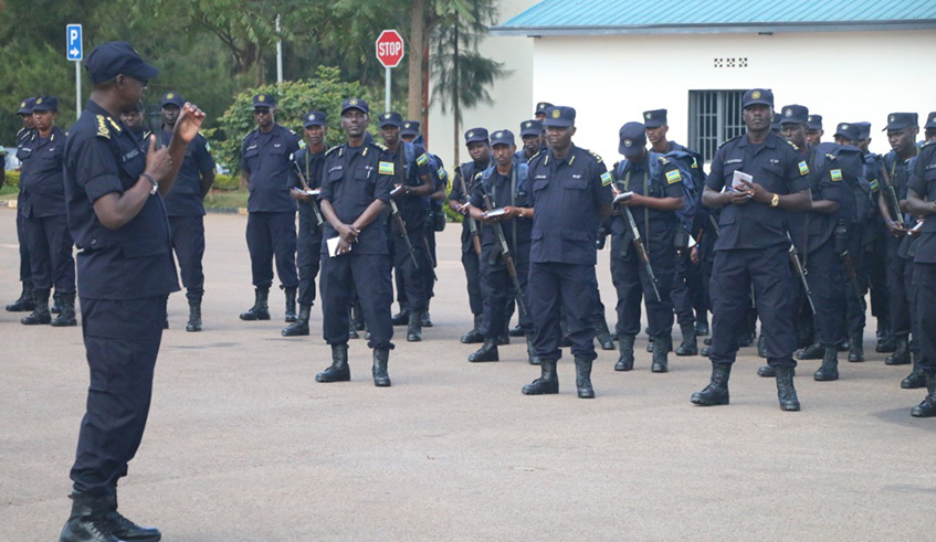 IGP Dan Munyuza briefs the departing police peacekeepers yesterday. Courtesy.