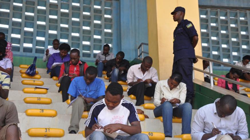 Driving licence seekers during a past provisional test at Amahoro Stadium. File.