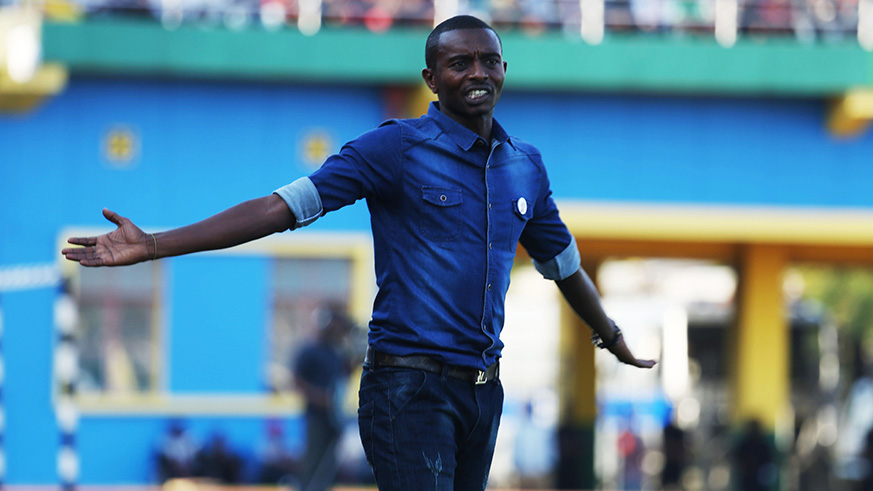 Djuma Masudi disagrees with a refereeu2019s decision during a past league match at Kigali Stadium. The Burundi-born tactician was appointed as AS Kigali head coach in October. File