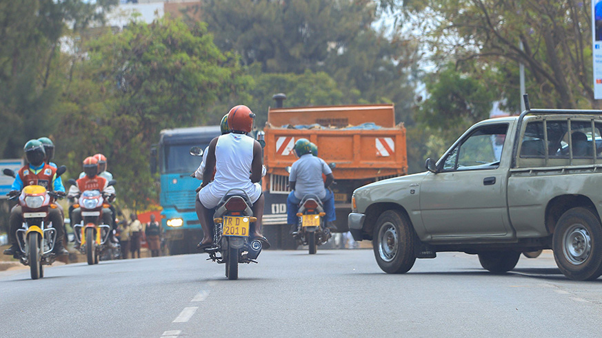 Taxi moto operators on the road in Kicukiro District. Over a year ago, they petitioned the Lower House appealing for an inquiry into the bottlenecks to their business operations. Emmanuel Kwizera.