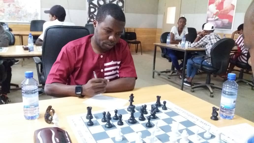 Florent Niyongira analyses his position before taming reigning champion Dr Ben Karenzi in round 5 on Saturday. Courtesy