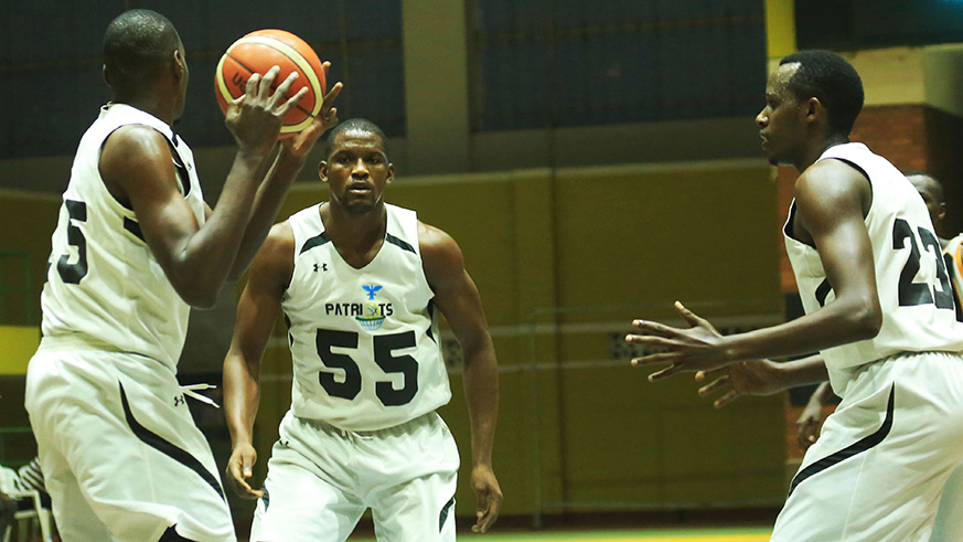 Steven Havugintwari (left) scored 23 points as Patriots overcame REG 82-78 at Amahoro Stadium on Friday. File.