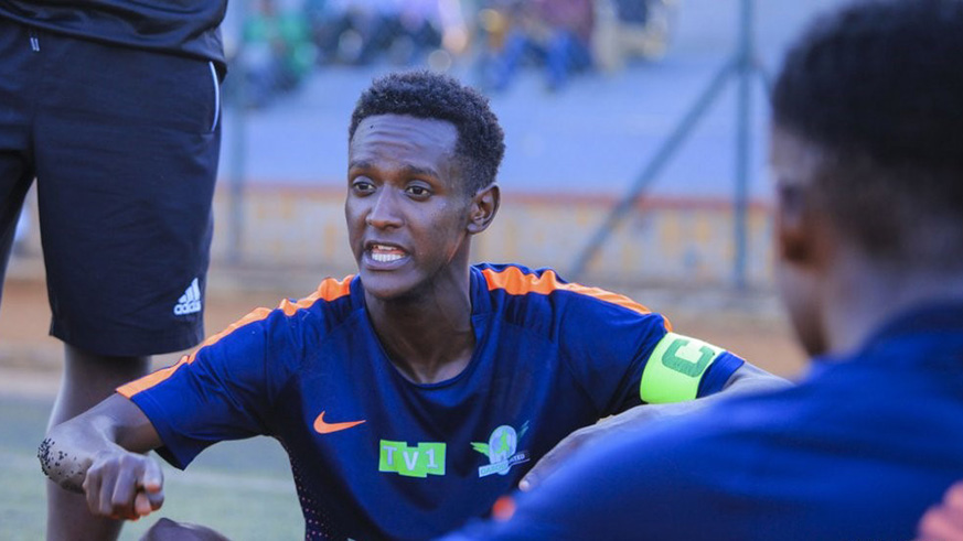 Skipper Marc Nkubana, seen here talking to his teammates at half-time, scored the winning goal as Gasogi overcame SEC Academy 2-1 at Kicukiro Stadium on Saturday. Julius Ntare.