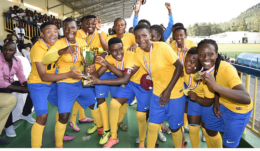 AS Kigali players show off their trophy after edging Scandinavia 1-0 to win a record-exending 10th league title at Umuganda Stadium in June last yea.  File photo.
