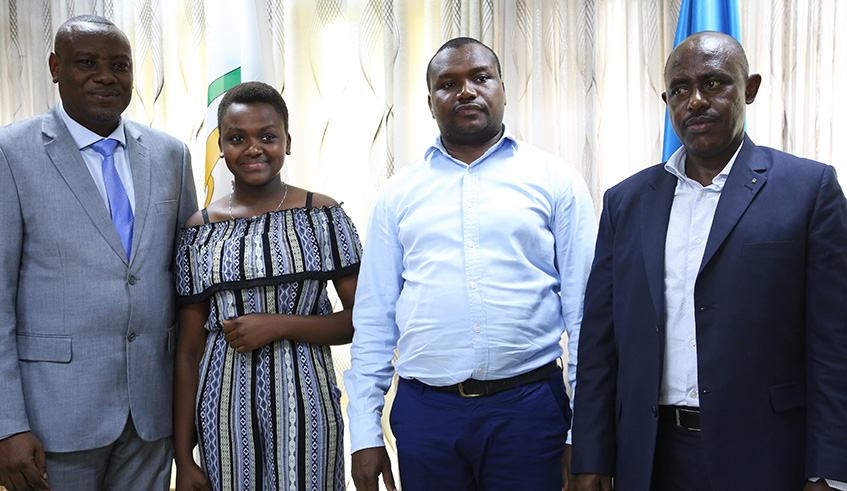 Ora Gratia Rutayisire (2nd left) from Maranyundo Girls School in Nyamata Sector of Bugesera District was the second best student in O Level. Sam Ngendahimana