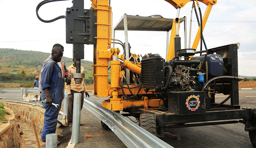 Road construction in 2018 was a priority. workers fixing a guardrail at Kayonza-Nyagatare road .Sam Ngendahimana