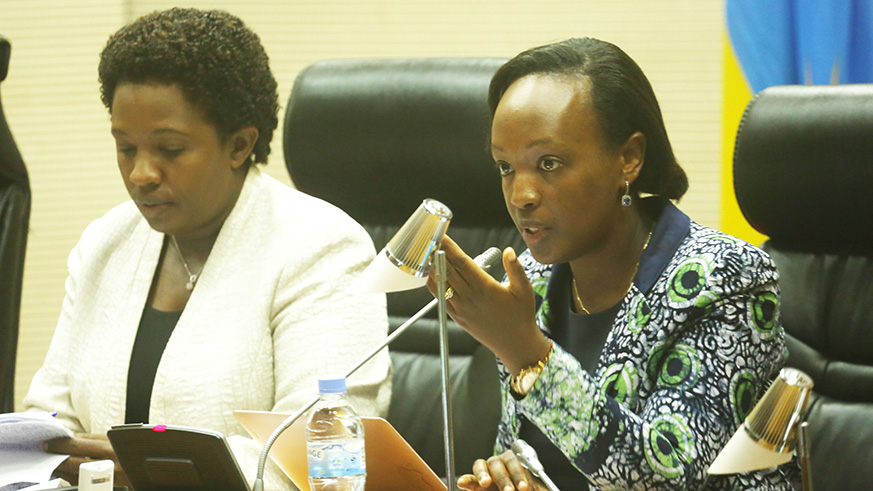 Nadine Umutoni Gatsinzi, the Permanent Secretary in the Ministry of Gender and Family Promotion (right), addresses members of parliament as MP Odette Uwamariya looks on yesterday. Parliamentarians were urged to increase their awareness campaigns across the country to ensure that citizens understand the role of gender equality in fast-tracking national development. Sam Ngendahimana.