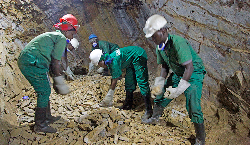 Miners at work inside Mageragere mining site in Nyarugenge District in March this year. File..