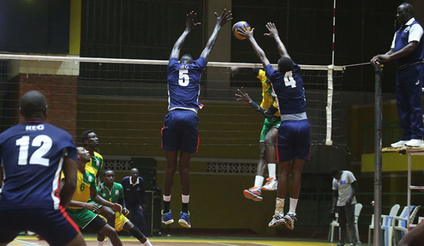 REG volleyball club players block a UTB player during a past league match at Amahoro Indoor Stadium. File photo.
