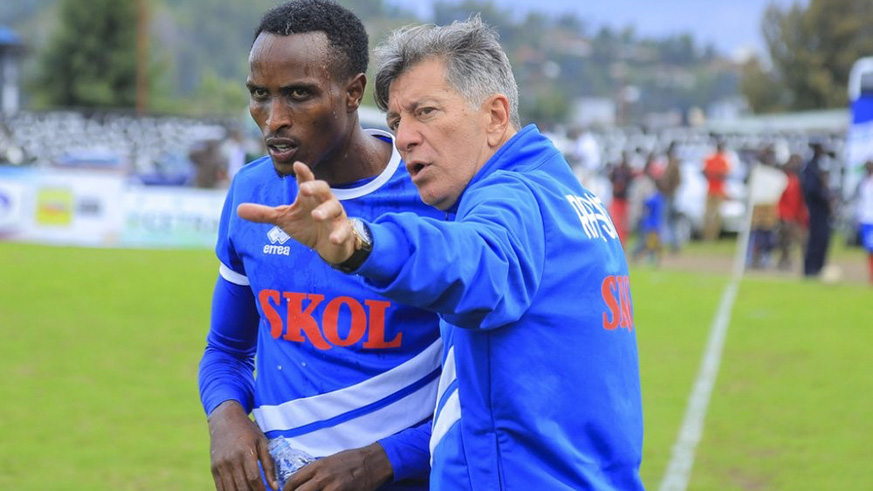 Brazilian Roberto Oliveira briefs left-back Eric Irambona during the second-half as Rayon Sports overcame Musanze 2-1 at Ubworoherane Stadium on Saturday. Igihe.