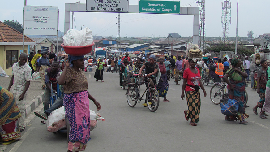 Rwandans and Congolese at the Rwanda-DR Congo border in Rubavu District. Authorities confirmed they are aware of Congolese nationals arriving in Rubavu over safety concerns. Ru00e9gis Umurengezi.
