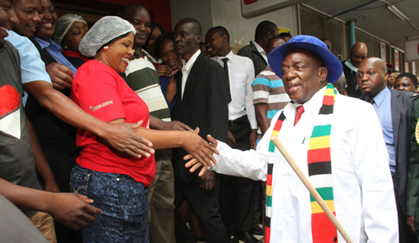 President Mnangagwa greets shoppers during a national clean-up campaign at Fife Avenue Shopping Centre in Harare yesterday. Innocent Makawa