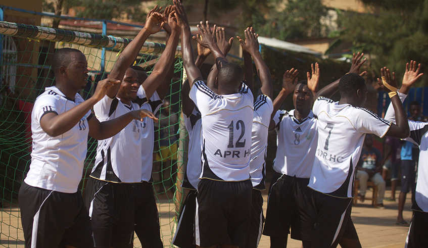 APR Handball Club players celebrate a goal during a past league match against Police at Kimisagara Youth Centre. Sam Ngendahimana.