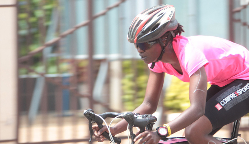 Hanani Uwineza, 25, is seen here during a bicycling section of the 2018 Liberation Duathlon Challenge. File.