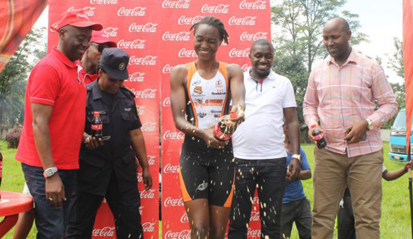 Hanani Uwineza celebrates after winning Rubavu Triathlon Challenge last March. File.