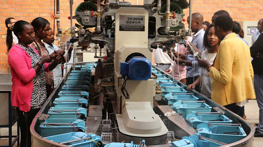 Workers reel silk filaments at the Rwanda Silk Processing Factory. Courtesy.