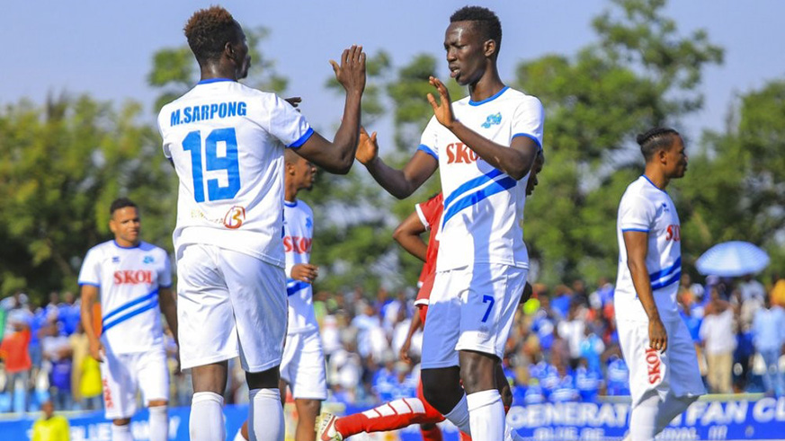 Bonfils Caleb Bimenyimana (#7) congratulates Micheal Sarpong (#19) after scoring the third goal during the 3-0 win over Kirehe at Kigali Stadium on Sunday. Igihe.