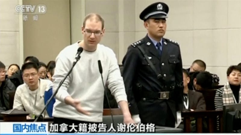 A still image taken from CCTV video shows Robert Lloyd Schellenberg in court in Dalian, Liaoning province. / Internet photo