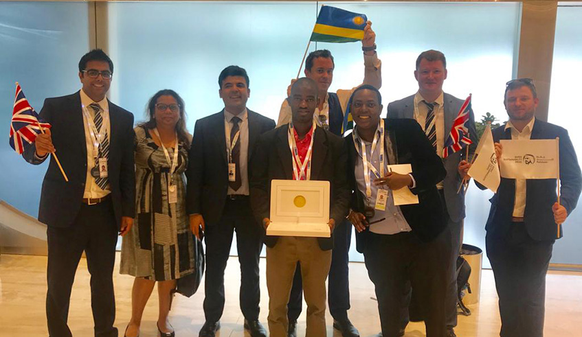 BBOXX Executive Management celebrate with one of their customers, Jean Muhire, in Abu Dhabi. Courtesy.