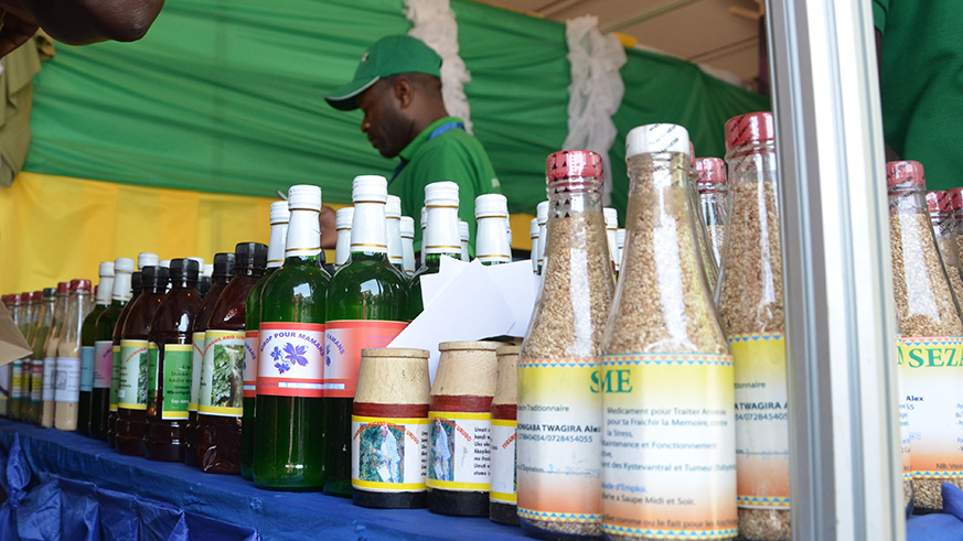 A traditional doctor exhibits some of his medicines during a past trade fair. Government  has banned advertisement of medical services.  File. .