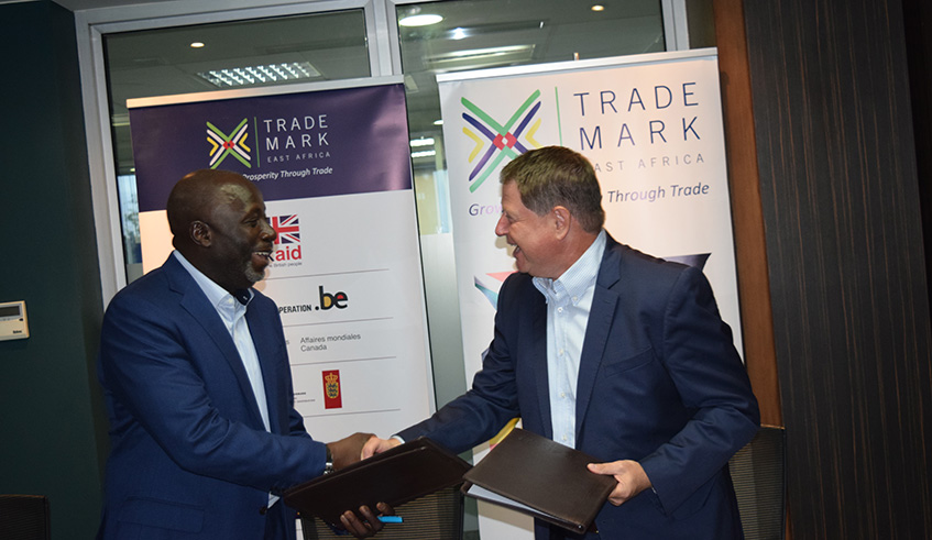 AfroChampions board chairman Ali Mufuruki, and TMEA CEO Frank Matsaert (right) following the signing of the agreement to support the CFTA process. Net. 