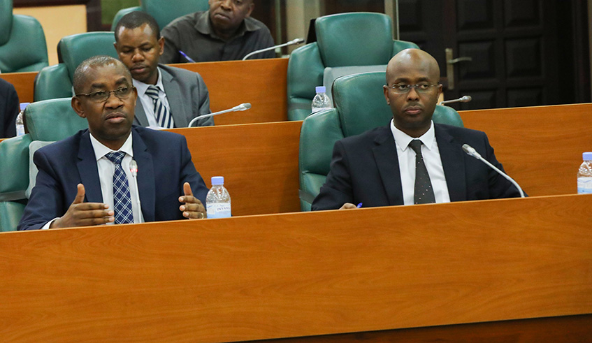 The Commissioner General of RRA, Pascal Ruganintwali (L) appears before the senate yesterday along with NISR director-general Yusuf Murangwa (right) yesterday. Emmanuel Kwizera