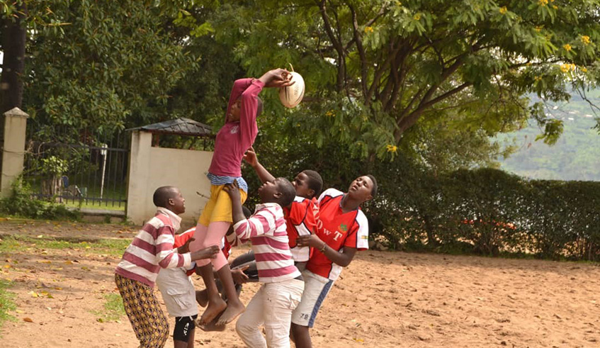 Young girls, members of Gorilla Girls Rugby Academy, during a past training session on the shores of Lake Kivu. 